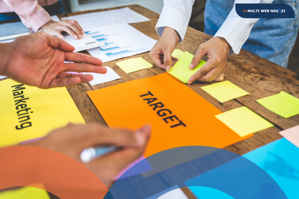 Team di lavoro che pianifica una strategia di marketing a gennaio, con focus su obiettivi, target e analisi dei dati per la crescita del negozio.