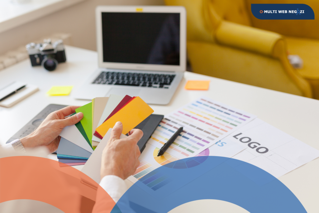 Professionista che sceglie palette colori e logo per definire l’identità e l’immagine del brand di un negozio.